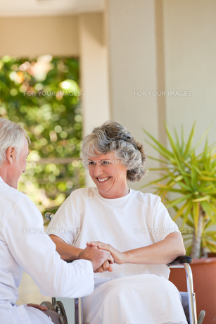Doctor with his patient in her wheelchair FYI00483888 Doctor with his patient in her wheelchair FYI00483888
